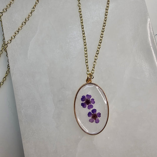 Clear with Purple Flowers Oval Pendant Resin Necklace